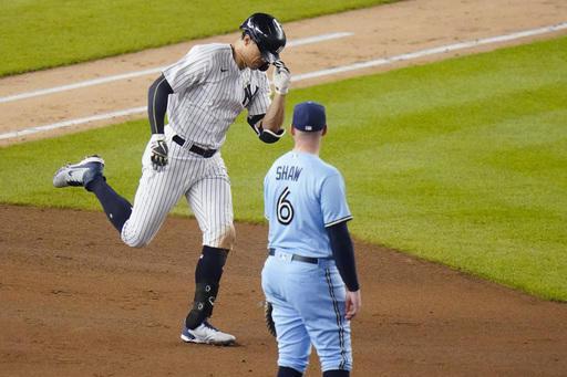 Yanks hit 5 HR in inning, top Toronto 10-7 for 8-game streak