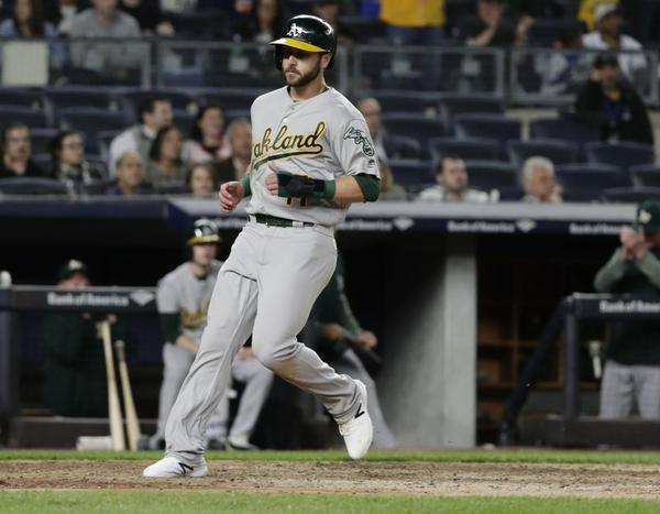 Healed, A's Fowler makes it to Yankee Stadium, gets 1st hit