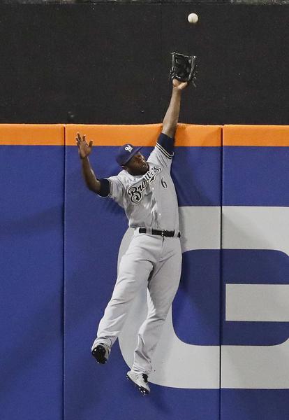 Cain helps Brewers beat deGrom, Mets 10-2