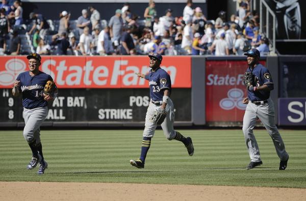 Shaw, Vogt homer, NL Central-leading Brewers beat Yanks 5-3